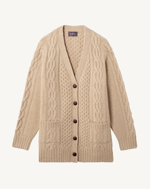 Cable knit loose cardigan with pockets and side slits